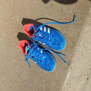 Adidas blue and orange soccer shoe